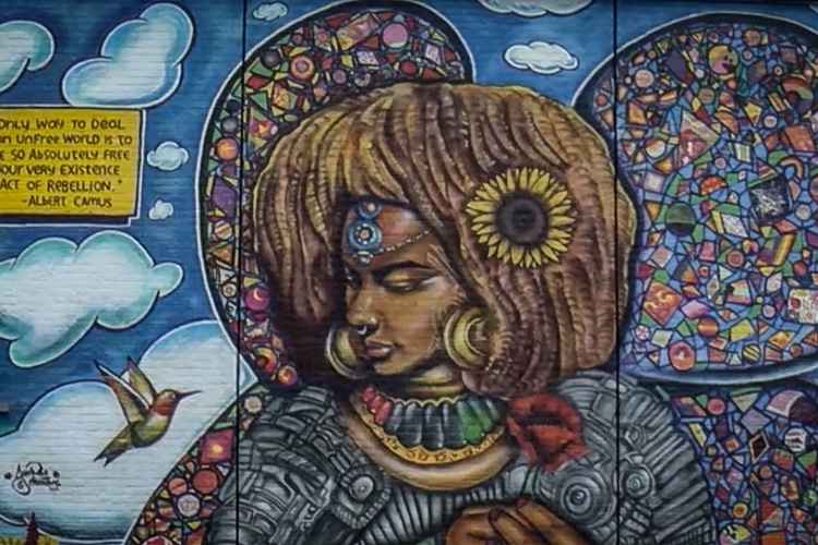 Mural painting of beautiful Black afronaut, Kelis.