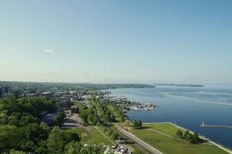 View of Burlington with large sky and Lake Champlain