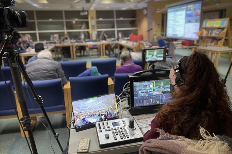 Nora livestreams a municipal meeting