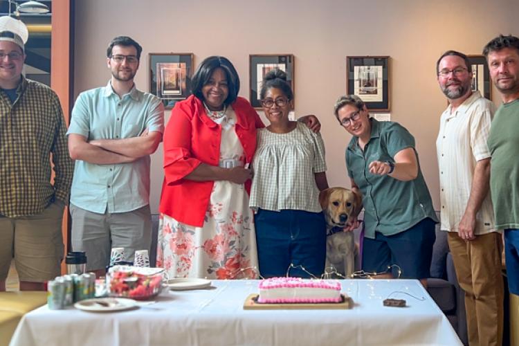 Logan, Patrick, Pastor Ramona, Kendra, Willow (dog), Jess, Seth, and Matt celebrate Pastor Ramona's birthday