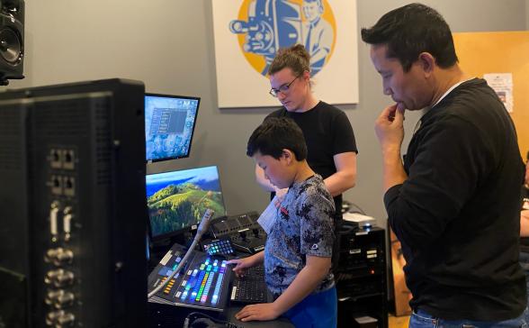 Jordan teaching a workshop in the TV studio control room