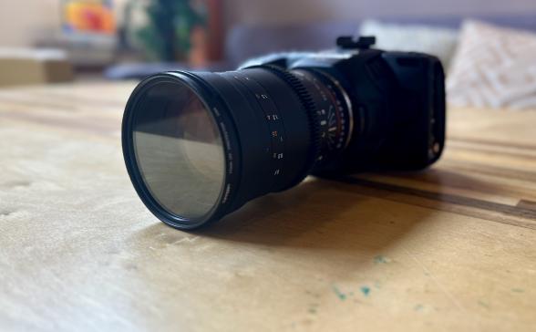 A DSLR camera with a lens