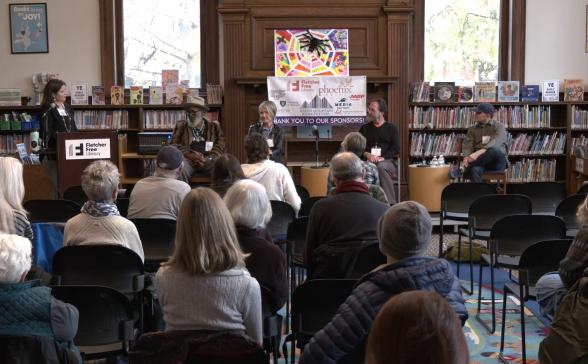 Author panel with audience at library