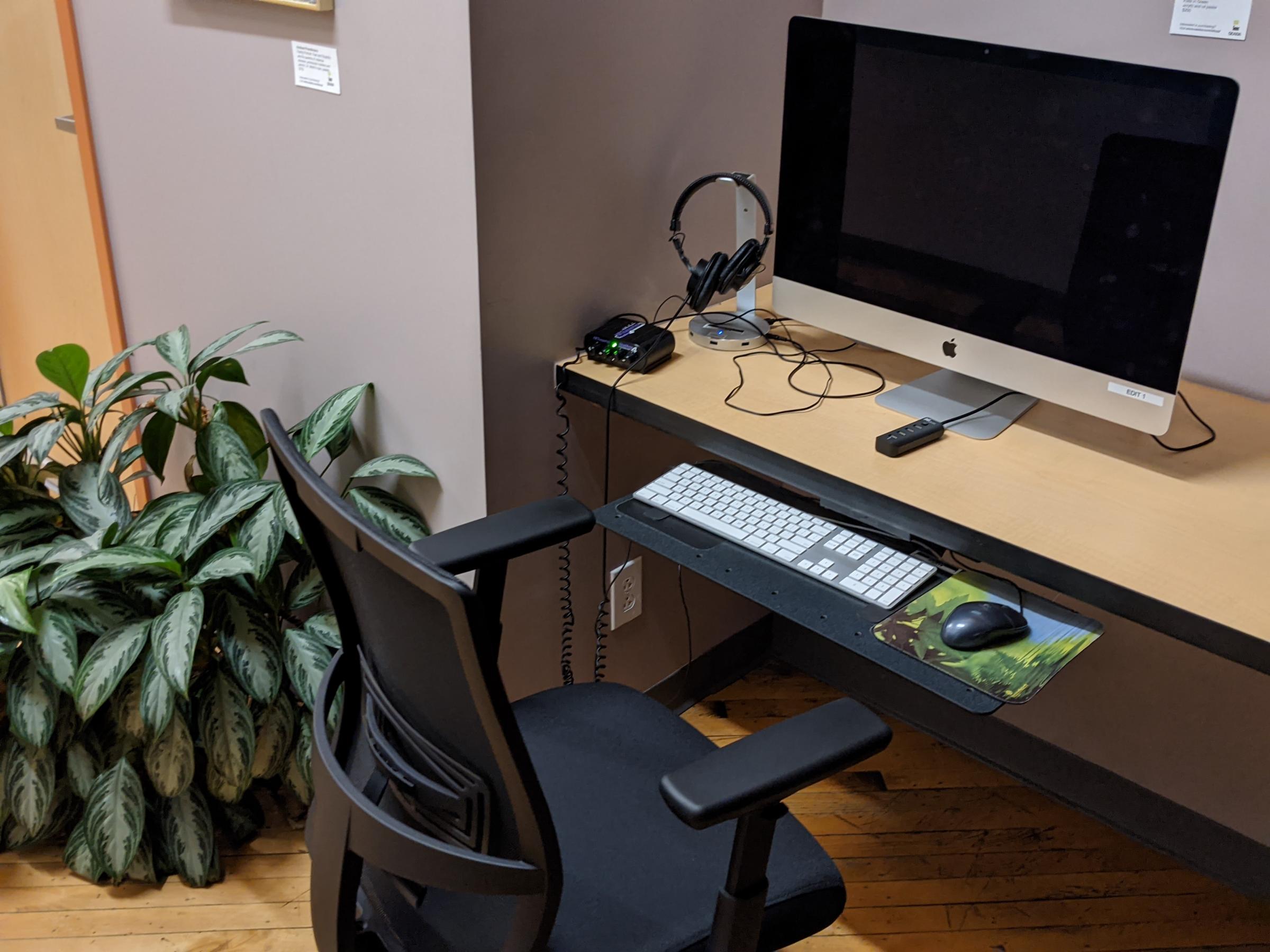 Edit station with computer and chair