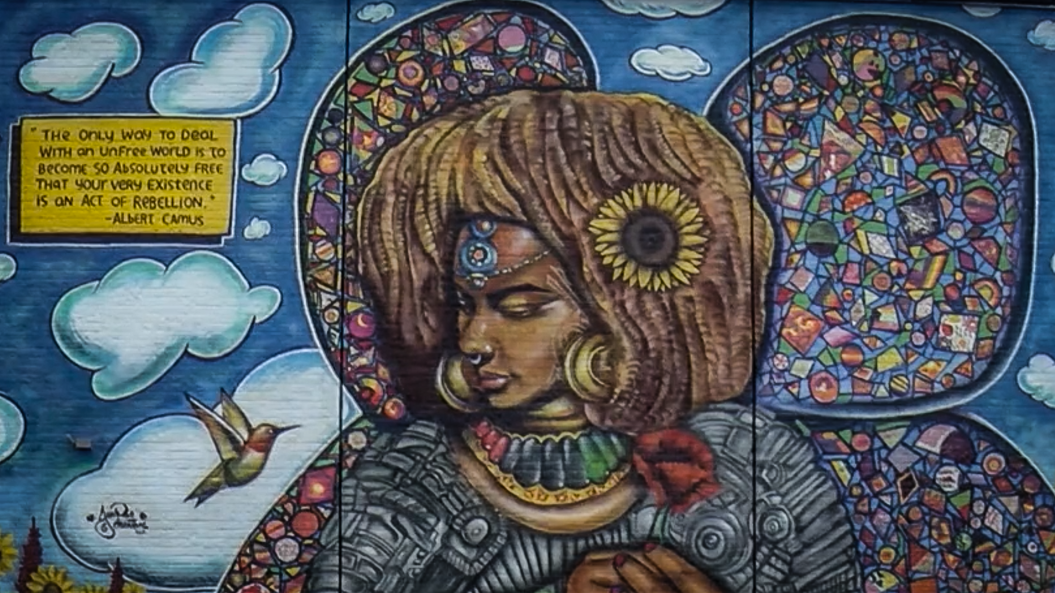 Mural painting of beautiful Black afronaut, Kelis.