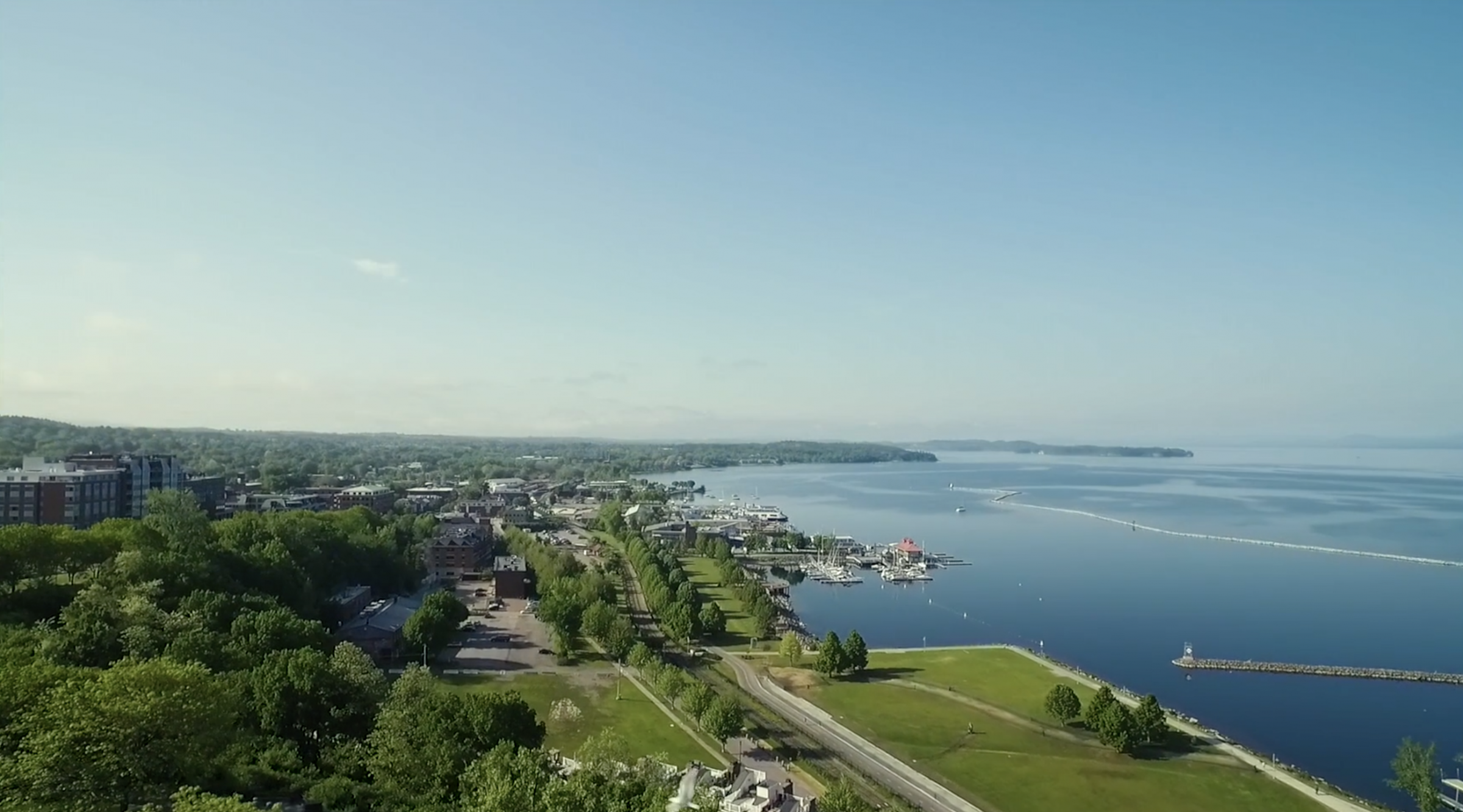 View of Burlington with large sky and Lake Champlain