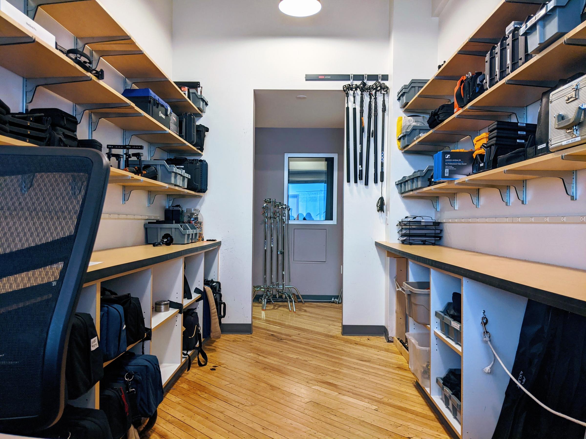 the gear room: media equipment on shelves for reservations