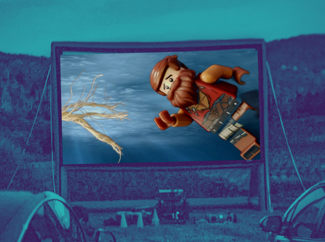 outdoor movie screen with lego figure from Cast Away remake