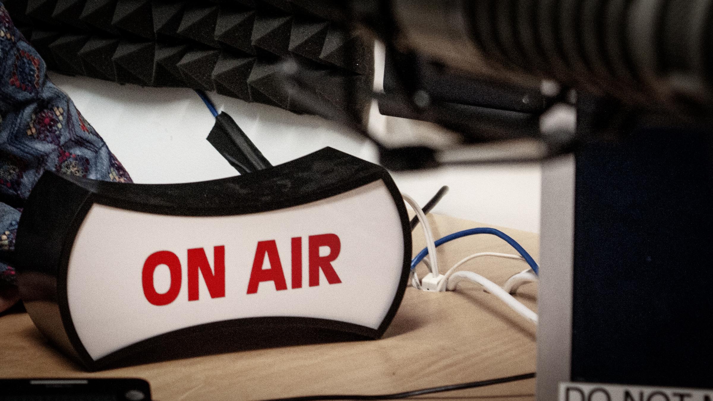 The on air light in the radio station