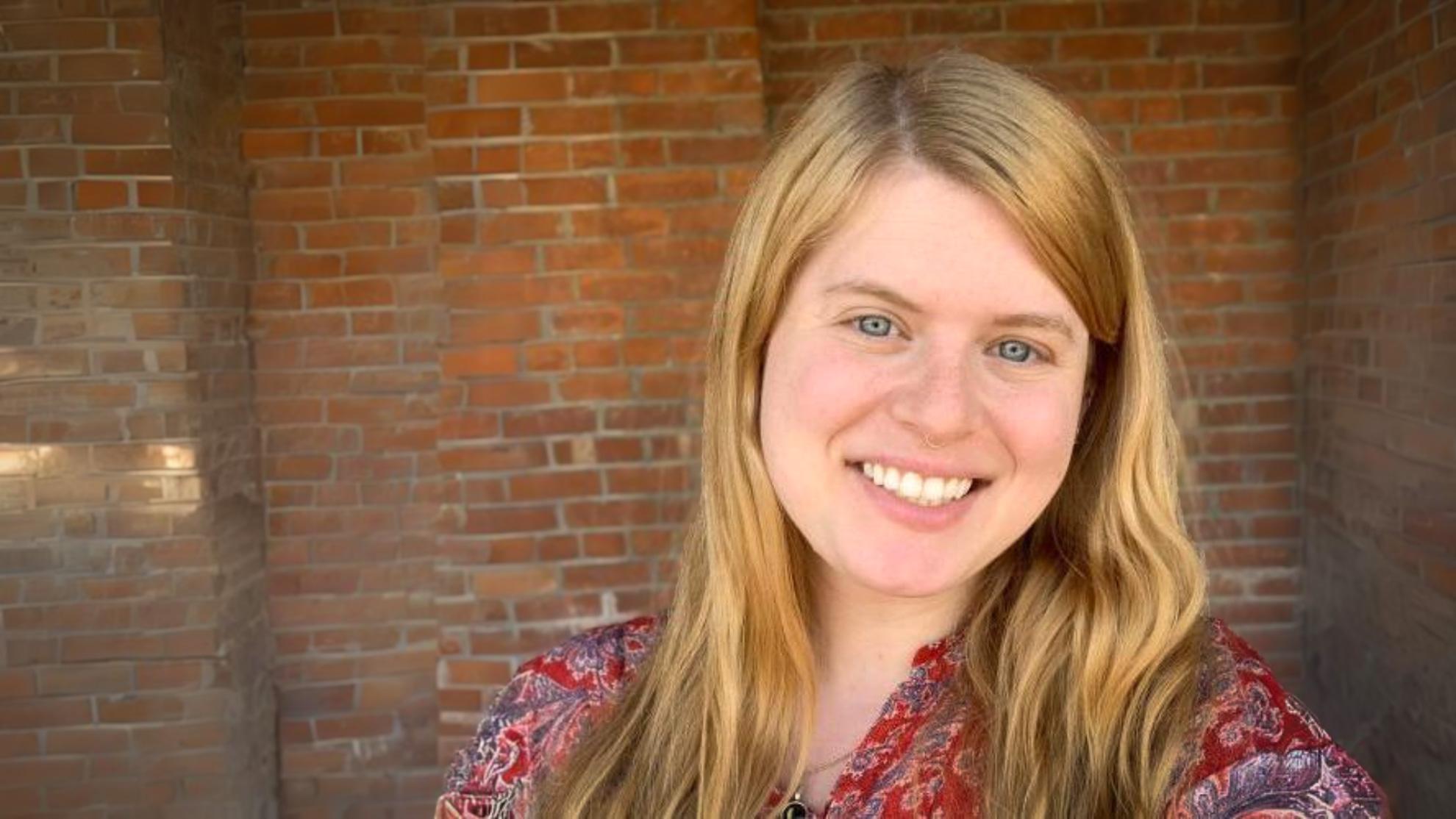Photo of Katie, a person with fair skin and blond hair