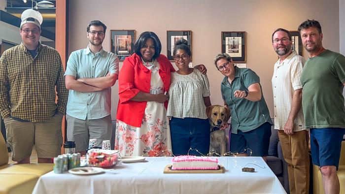 Logan, Patrick, Pastor Ramona, Kendra, Willow (dog), Jess, Seth, and Matt celebrate Pastor Ramona's birthday